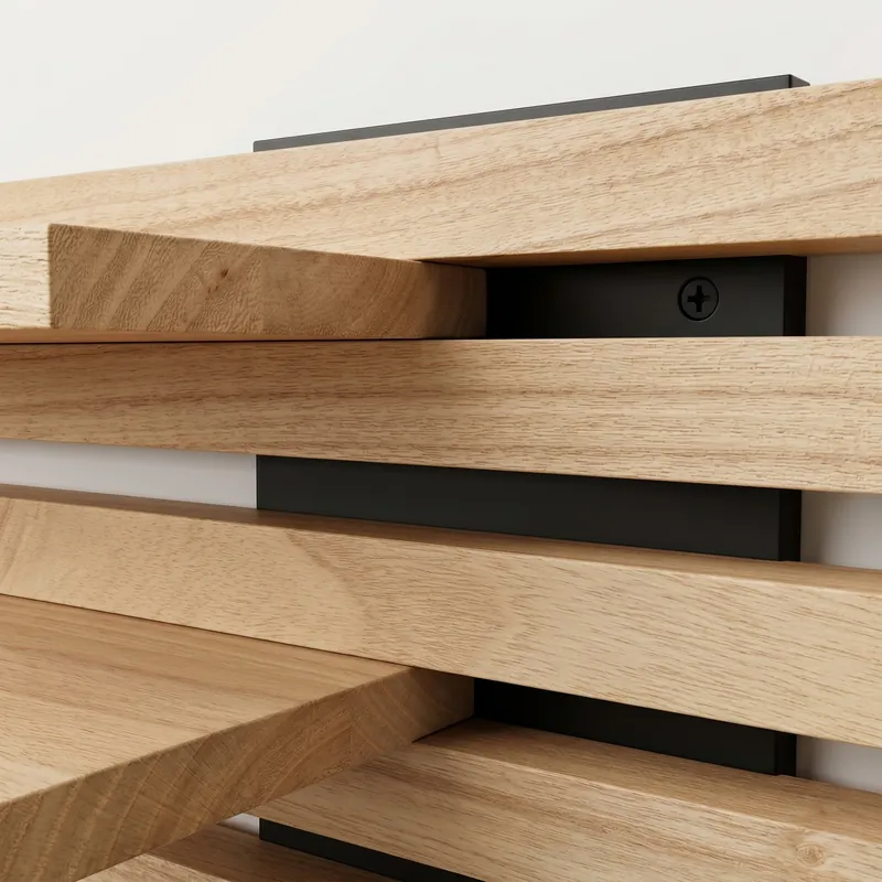 Close-up of the Paulownia slats and shelves in front of the black base panel